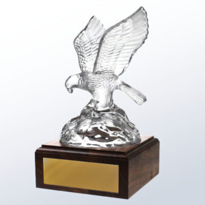 Crystal eagle trophy with outstretched wings on wood base, gold nameplate, ideal for corporate or employee recognition awards.