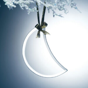 Crystal crescent moon trophy with gold accent, displayed on a snowy branch; ideal for corporate or milestone recognition.
