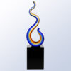 Crystal flame trophy in blue, orange, and yellow on black base, ideal for corporate recognition or milestone awards.