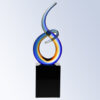 Crystal award trophy with blue, yellow, and orange swirls on black pedestal, ideal for corporate or employee recognition.