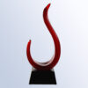 Crystal flame award with curved red glass on black base, ideal for corporate or employee recognition.