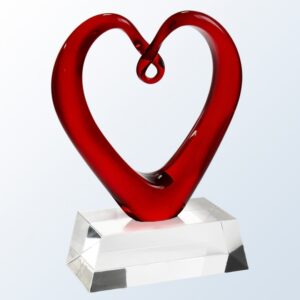 Crystal heart trophy with open center on clear base, ideal for corporate recognition or employee achievement awards.