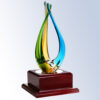 Crystal trophy with green, yellow, and blue curves on a polished wood base, ideal for corporate or employee achievement awards.