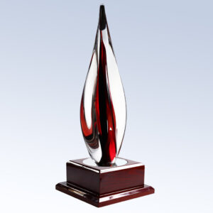 Crystal flame trophy in clear and red glass on a wooden base, ideal for corporate achievement or employee recognition awards.
