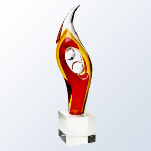 Crystal trophy with red and yellow accents, dual clear spheres, on a clear base; ideal for corporate or milestone recognition.