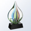 Crystal teardrop trophy with blue, pink, and green swirls on black base; ideal for employee or corporate recognition.