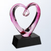 Pink crystal heart trophy on black base, ideal for employee recognition or corporate milestone awards.