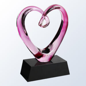 Pink crystal heart trophy on black base, ideal for employee recognition or corporate milestone awards.