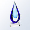 Teardrop crystal trophy with blue and clear glass on a clear base, ideal for corporate recognition or milestone awards.