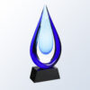 Blue teardrop crystal award with clear center on a black base, ideal for corporate or employee recognition.