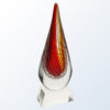 Crystal teardrop award with red and yellow swirls on clear base, ideal for corporate or employee recognition.