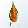 Crystal trophy with orange, yellow, and green swirls on clear faceted base, ideal for corporate or employee recognition.