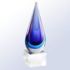 Teardrop crystal glass award with blue and purple hues on clear base, ideal for corporate or employee recognition.