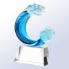 Crystal wave trophy of hand-blown blue and clear glass on faceted base, ideal for corporate recognition or milestone awards.
