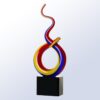 Crystal award trophy with red, yellow, and blue ribbon design on black base, ideal for corporate or employee recognition.
