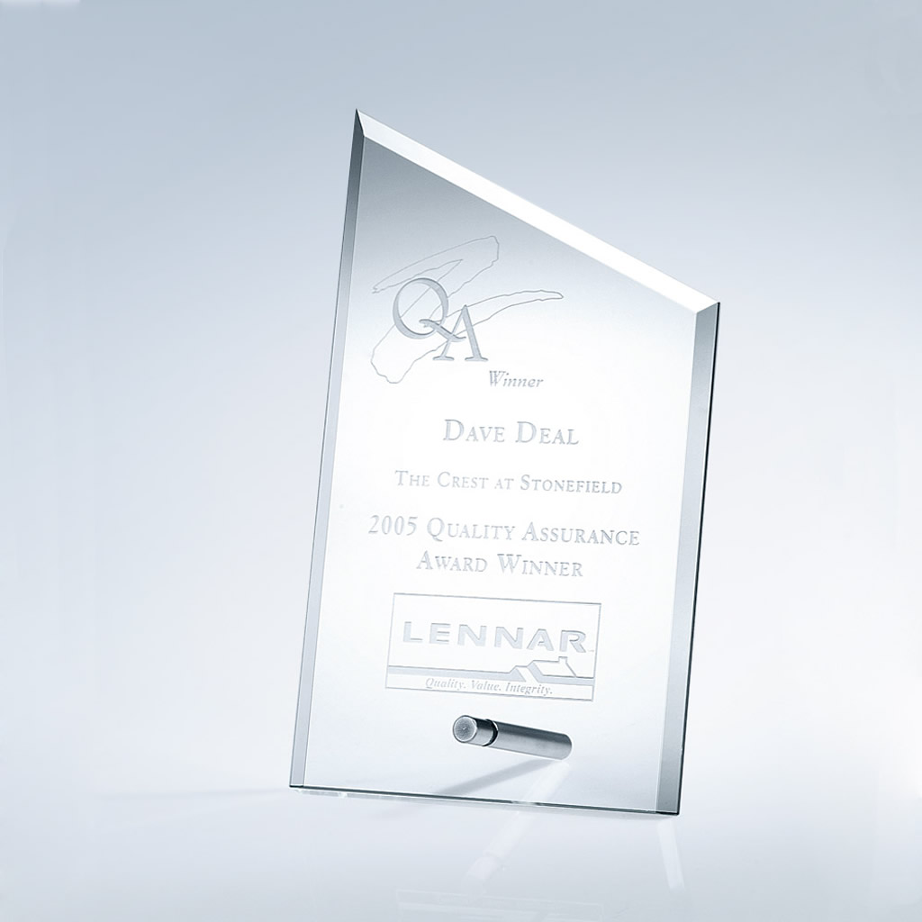 Crystal plaque with beveled edges and slanted top on aluminum pole, for corporate quality assurance recognition.