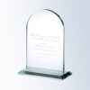 Crystal plaque trophy with rounded top on beveled base, engraved to recognize contributions or achievements.