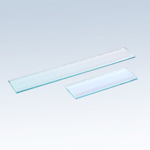 Jade glass crystal ruler award and larger transparent ruler, ideal for corporate recognition on gradient background.