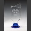 Crystal award trophy with blue base, engraved for Hampton by Hilton Employee of the Year corporate recognition.