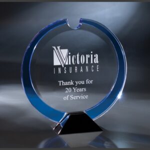 Crystal glass trophy with blue accents and black base, recognizing 20 years of service for Victoria Insurance.