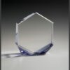Hexagonal crystal trophy on light surface, ideal for corporate achievements or employee recognition awards.