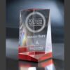 Crystal trophy with red glass base, engraved Platinum Advisor, Aaron Taft, SunAmerica; corporate award for achievement.