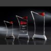Clear crystal star awards with red accents, perfect for corporate or employee recognition. Center trophy engraved for top performer.