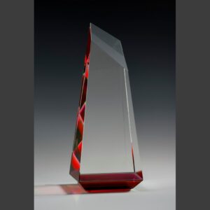 Crystal trophy with red liquid accent, ideal for corporate recognition or employee achievement awards.