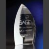 Crystal trophy engraved with SAGE Excellence Award and recipient name, on a dark blue background—ideal for corporate recognition.