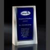 Blue and white crystal plaque recognizing outstanding corporate service, framed in white, suitable for excellence awards.