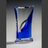 Crystal trophy with clear and blue glass sections on a flat base, ideal for corporate or employee achievement recognition.