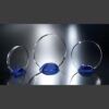 Crystal glass trophy awards with blue bases in three sizes, ideal for corporate recognition or employee milestones.