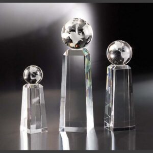 Crystal awards, including the Discovery Crystal Trophy, displayed for corporate or employee recognition.