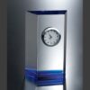 Crystal desk clock award in clear glass block with silver face, ideal for corporate or employee recognition achievements.