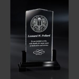 Crystal plaque award with Bar of Association seal, engraved for Leonard W. Pollard honoring years of corporate service.