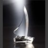 Crystal sailboat trophy on faceted base, ideal for corporate recognition or achievement awards.