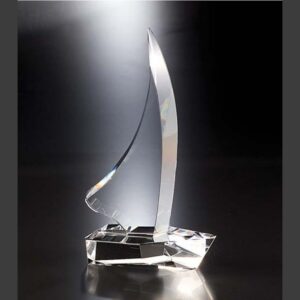 Crystal sailboat trophy on faceted base, ideal for corporate recognition or achievement awards.