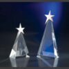 Crystal star awards of varying heights, clear crystal with metallic stars, ideal for employee or corporate recognition.