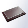 Crystal plaque with rosewood piano finish, clear acrylic front and metal corner accents, ideal for employee recognition awards.