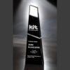 Black crystal triangular award plaque with white engraving, ideal for founder or milestone achievement recognition.
