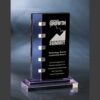 Rectangular crystal trophy on glass base, engraved for technology leadership achievement or corporate recognition.