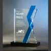 Crystal trophy with blue ribbon, ideal for corporate or employee recognition awards. Glass material.