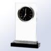 Crystal clock plaque with black round face and Roman numerals on rectangular base, ideal for corporate recognition awards.