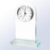Crystal clock trophy with white round face, black Roman numerals, and hands on rectangular glass base for corporate recognition.