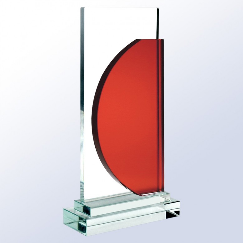 Crystal award with clear rectangular body, thick base, and red half-moon accent; ideal for corporate or milestone recognition.
